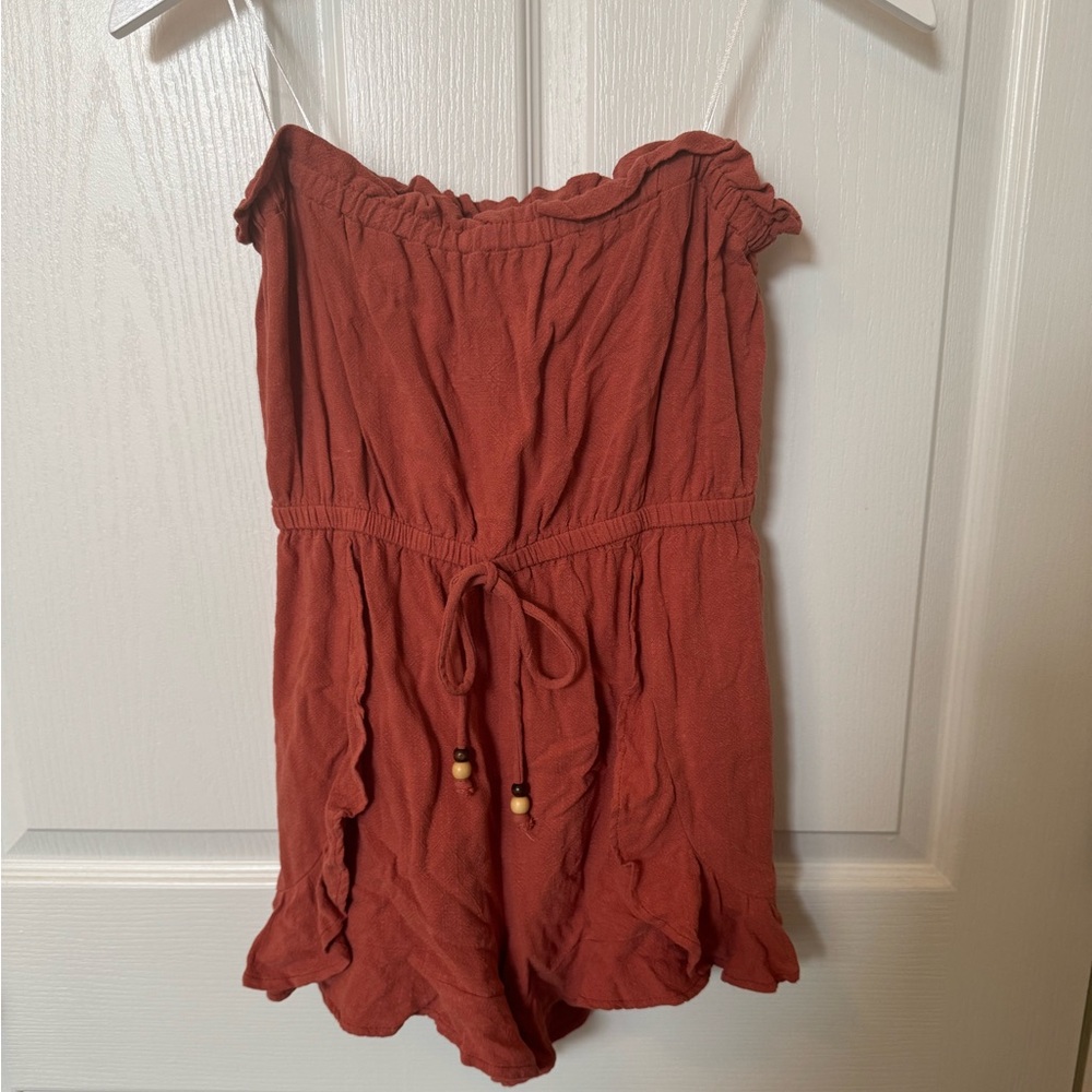 Pink Lily Romper Size M fits like a M